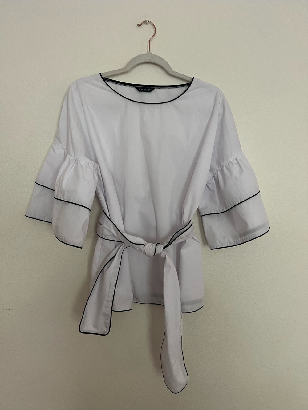 HAODUOYI White Peplum Tie-Front Blouse with Black Piping